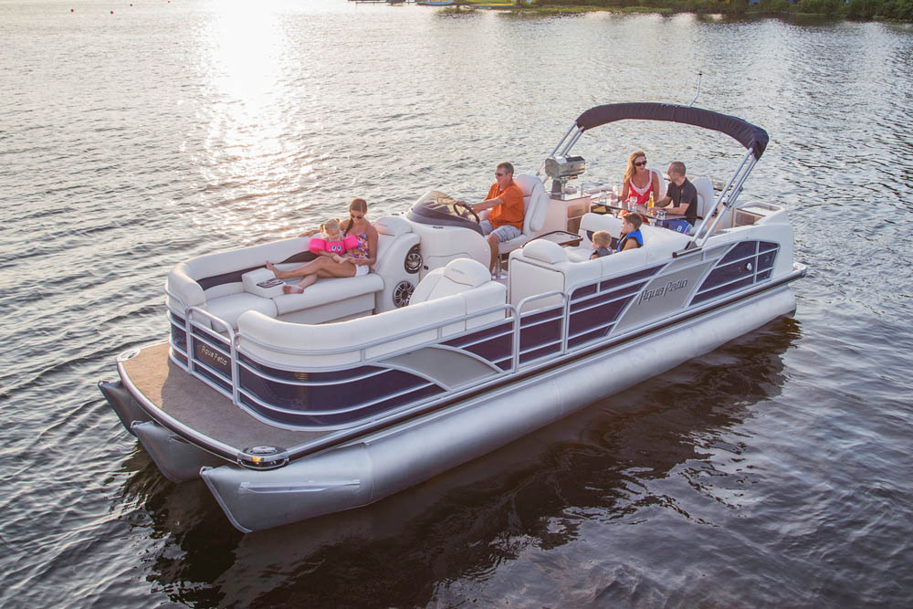 Family enjoying a ride on a Aqua Patio 25', 16 person, 225 horse powered Pontoon Boat