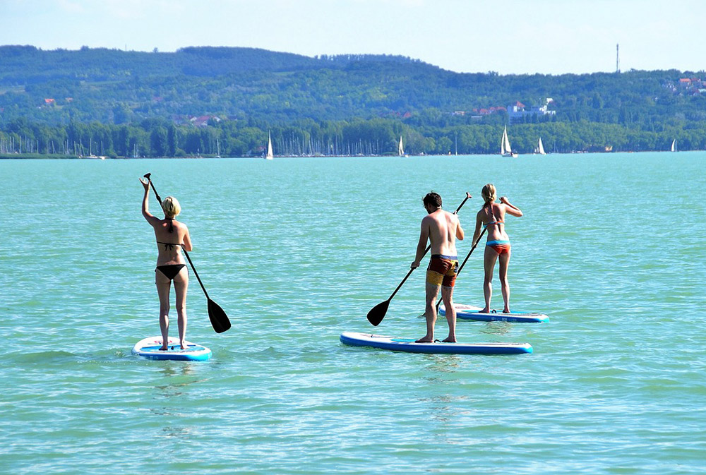 paddle boarding on an Aussie Watersports SUP rental 